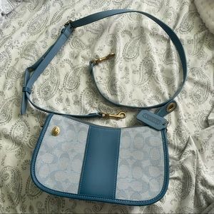Blue coach swinger bag
